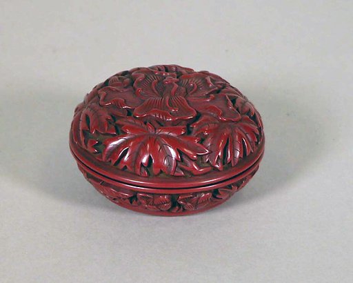 Covered box with hollyhock flowers