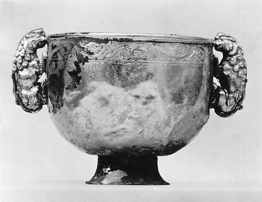 Cup with handles in the form of lions