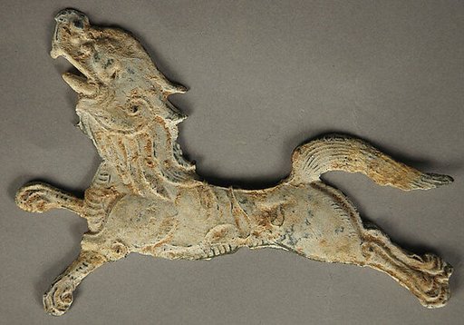 Plaque in the shape of a mythical animal