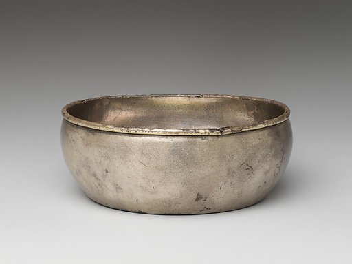Bowl with hollyhock flower