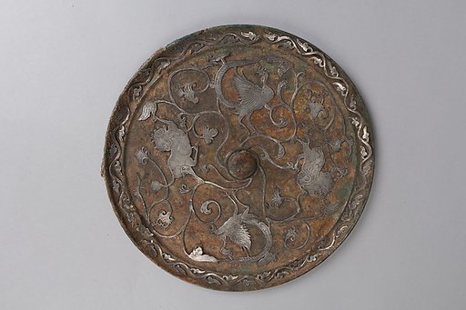 Mirror with birds and lions