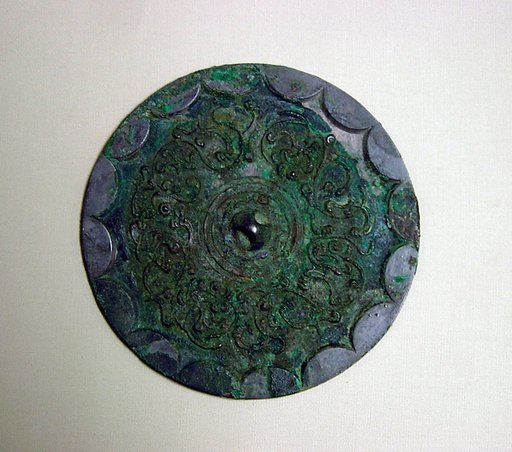 Mirror with interlaced dragons