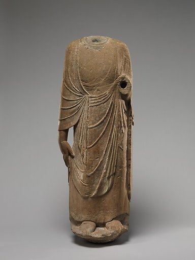 Buddhist attendant (possibly Kasyapa)