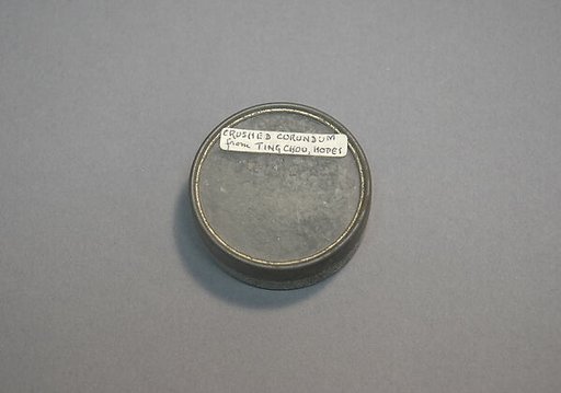Container of Crushed Corundum