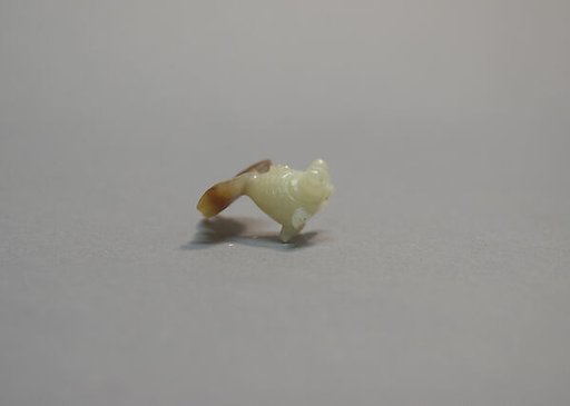 Piece of  "False Jade" Carved in Shape of a Flying Fish