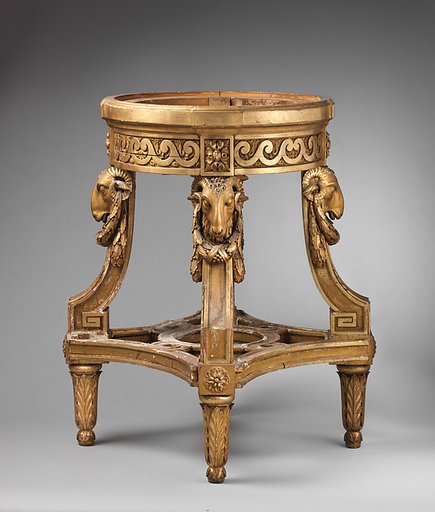 Vase stand with rams’ heads and carved neoclassical decoration