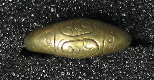 Ring Cast with Incised Scrolls