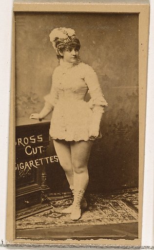 Standing actress resting hand on table, from the Actors and Actresses series (N145-1) issued by Duke Sons & Co. to promote Cross Cut Cigarettes