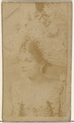 [Actress wearing ornate hat], from the Actors and Actresses series (N145-8) issued by Duke Sons & Co. to promote Duke Cigarettes