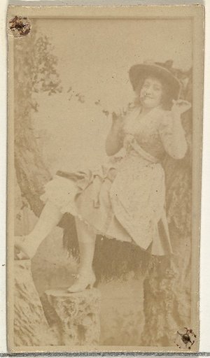 [Actress in studio reclining against prop trees], from the Actors and Actresses series (N145-8) issued by Duke Sons & Co. to promote Duke Cigarettes