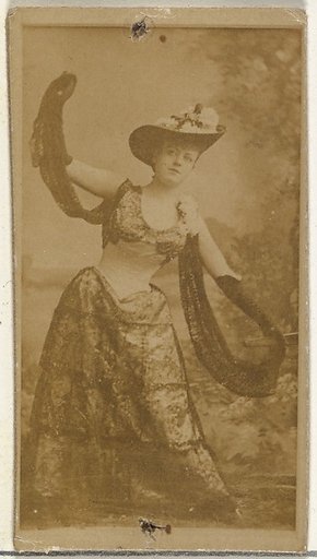 [Actress in full-length shows off ornate gown], from the Actors and Actresses series (N145-8) issued by Duke Sons & Co. to promote Duke Cigarettes