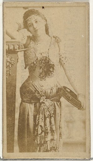 [Child holding tambourine], from the Actors and Actresses series (N145-8) issued by Duke Sons & Co. to promote Duke Cigarettes