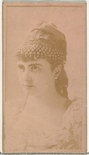 [Actress wearing ornate cap], from the Actors and Actresses series (N145-8) issued by Duke Sons & Co. to promote Duke Cigarettes