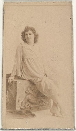 [Seated actress dressed in loose white gown], from the Actors and Actresses series (N145-8) issued by Duke Sons & Co. to promote Duke Cigarettes