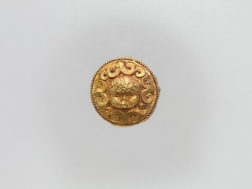 Cap-Shaped Plaque with Lion