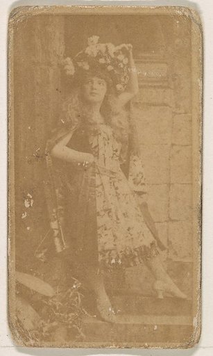 Actress wearing large floral piece in hair, from the Actresses series (N245) issued by Kinney Brothers to promote Sweet Caporal Cigarettes