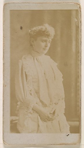 Actress in profile dressed in white gown, from the Actresses series (N245) issued by Kinney Brothers to promote Sweet Caporal Cigarettes