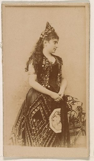 Actress in long dark gown, from the Actresses series (N245) issued by Kinney Brothers to promote Sweet Caporal Cigarettes