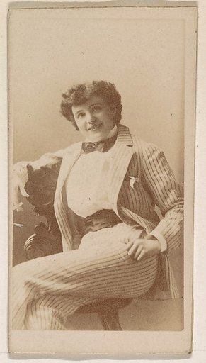 Actress dressed in pinstripe suit, from the Actresses series (N245) issued by Kinney Brothers to promote Sweet Caporal Cigarettes