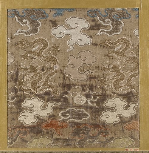 Textile fragment with pattern of dragons and clouds