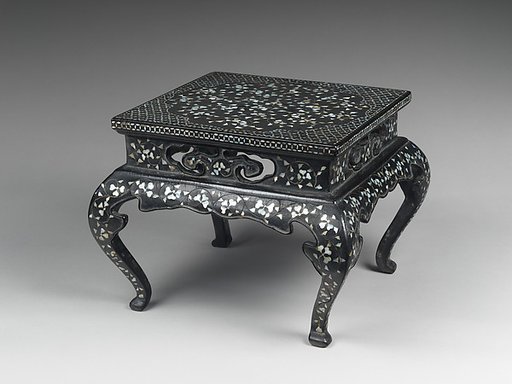 Table decorated with floral scroll