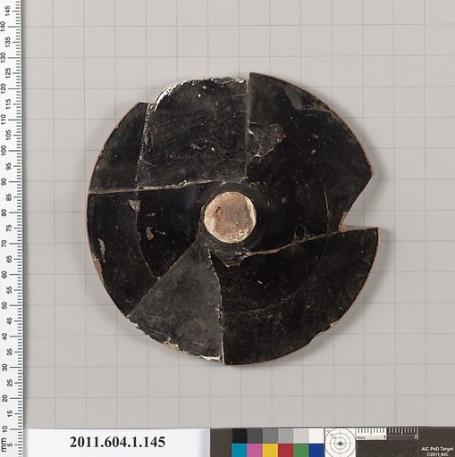 Terracotta fragment of a kylix (drinking cup)