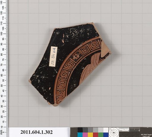 Terracotta fragment of a kylix (drinking cup)