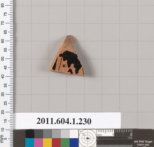 Terracotta fragment of a kylix (drinking cup)