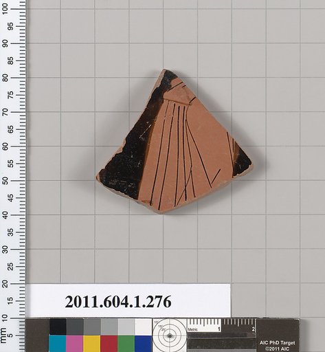 Terracotta fragment of a kylix (drinking cup)
