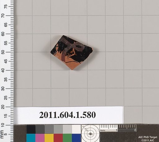Terracotta fragment of a kylix (drinking cup)