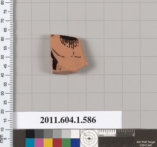 Terracotta fragment of a kylix (drinking cup)