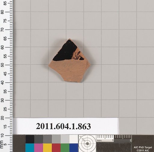 Terracotta fragment of a kylix (drinking cup)