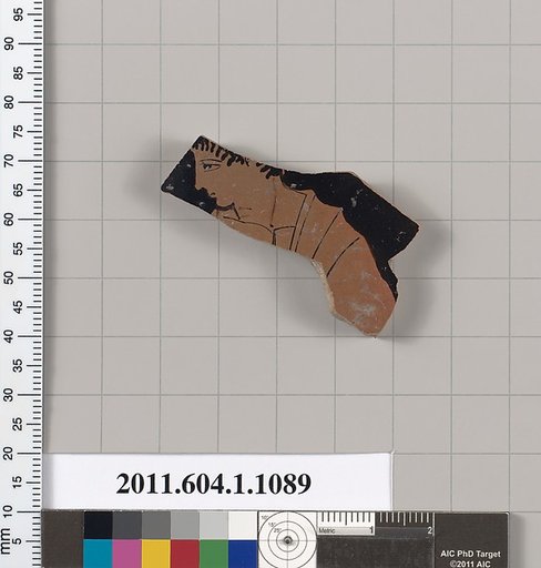 Terracotta fragment of a kylix (drinking cup)