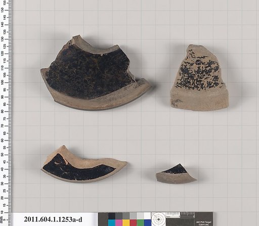 Terracotta fragments of kylikes (drinking cups)