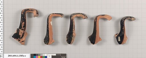 Terracotta fragments of kylikes (drinking cups)