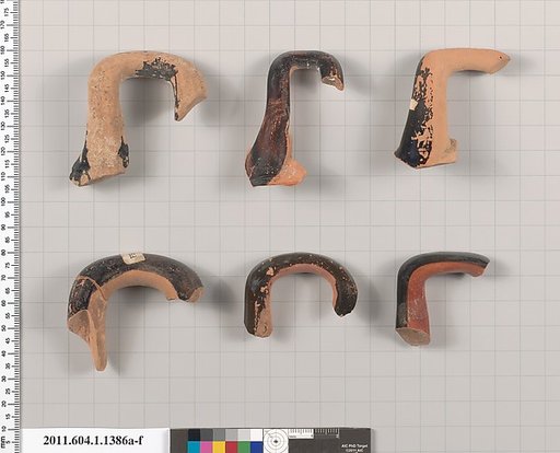 Terracotta fragments of kylikes (drinking cups)