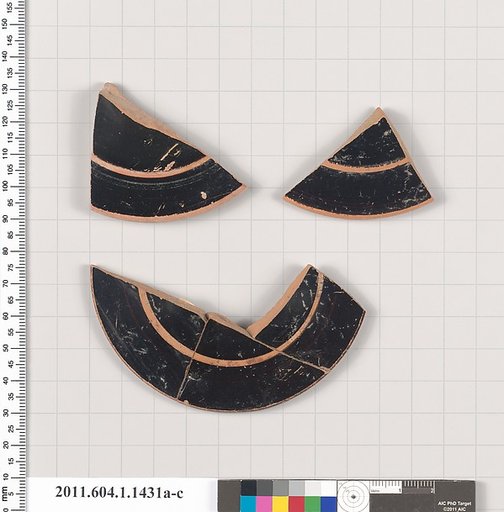 Terracotta fragments of kylikes (drinking cups)