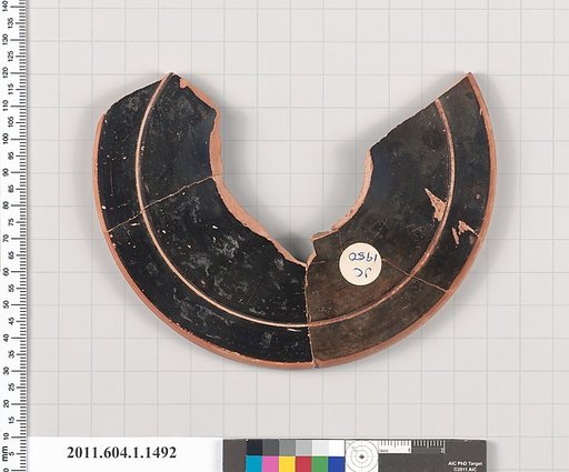 Terracotta fragment of a kylix (drinking cup)