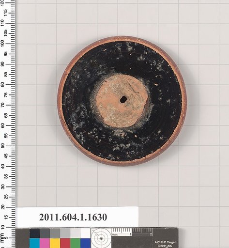 Terracotta fragment of a kylix (drinking cup)