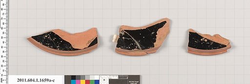 Terracotta fragments of a kylix (drinking cup)