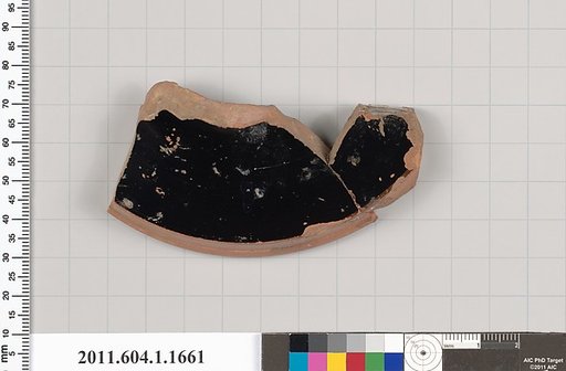 Terracotta fragment of a kylix (drinking cup)