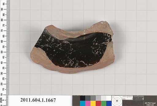 Terracotta fragment of a kylix (drinking cup)