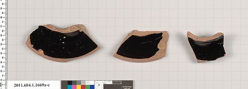 Terracotta fragments of kylikes (drinking cups)