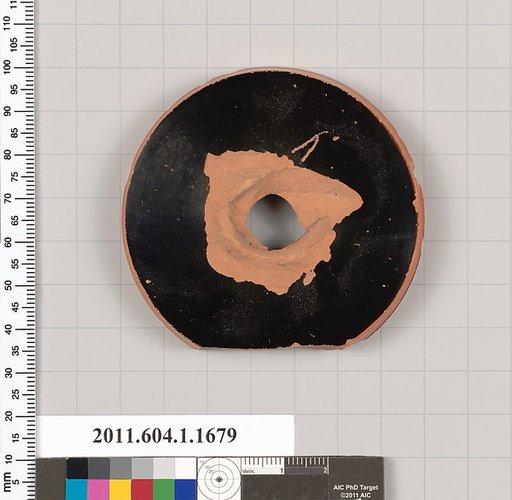 Terracotta fragment of a kylix (drinking cup)