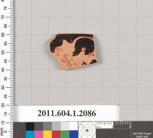 Terracotta rim fragment of a kylix (drinking cup)