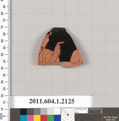 Terracotta rim fragment of a kylix (drinking cup)