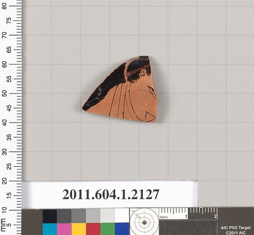 Terracotta rim fragment of a kylix (drinking cup)