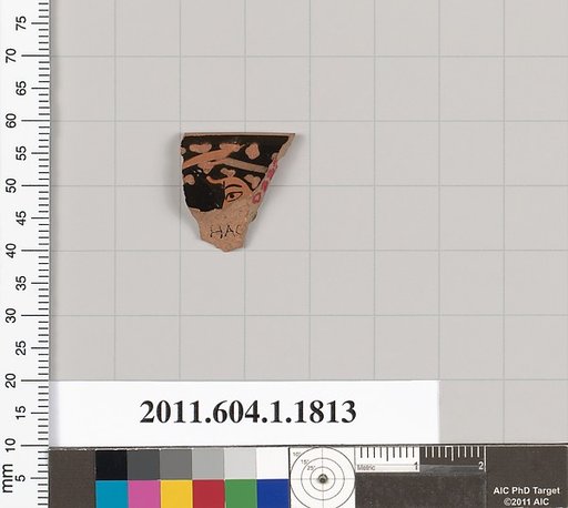 Terracotta rim fragment of a kylix (drinking cup)