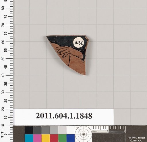 Terracotta rim fragment of a kylix (drinking cup)