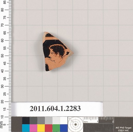 Terracotta fragment of a kylix (drinking cup)